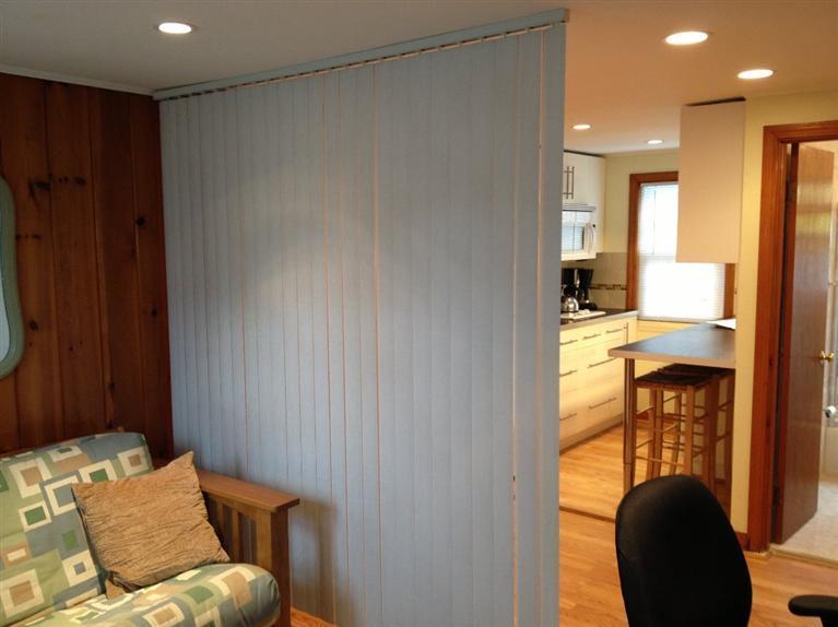 49 Lower County Road, Unit 16 Dennis Port, MA 02639 - Photo 6 of 12 a living room with furniture and a window