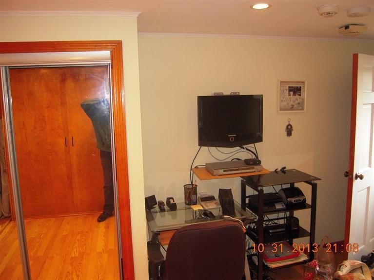 49 Lower County Road, Unit 16 Dennis Port, MA 02639 - Photo 9 of 12 a view of workspace with wooden floor windows