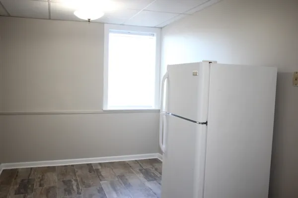 a view of walk in closet with window