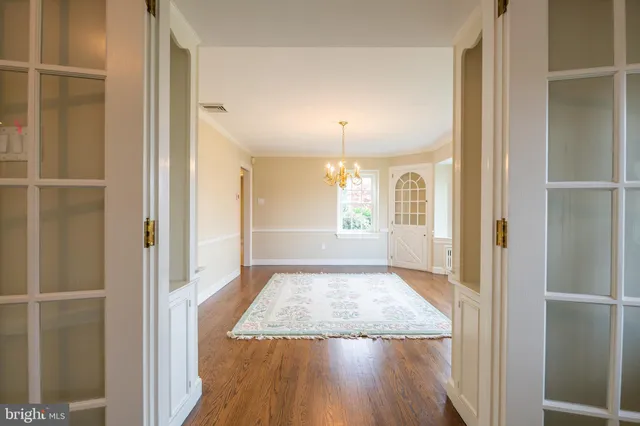 a view of entryway with wooden floor