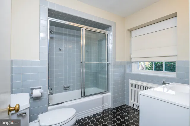 a bathroom with a sink a vanity and a mirror