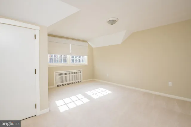 a view of a room with rack on the wall