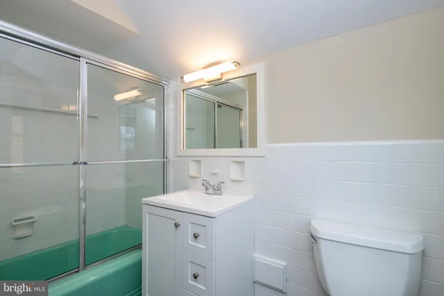 a kitchen with sink cabinets and window