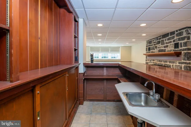 a view of a swimming pool and a yard