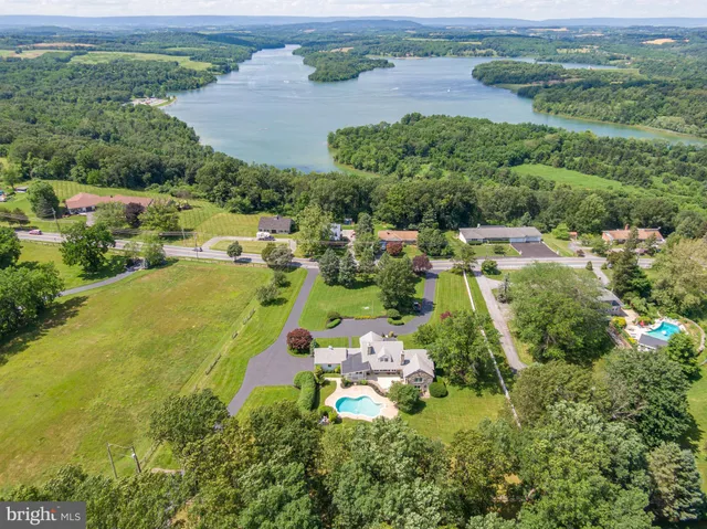 an aerial view of a house with a garden