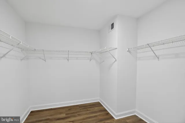a view of a room with racks on the wall