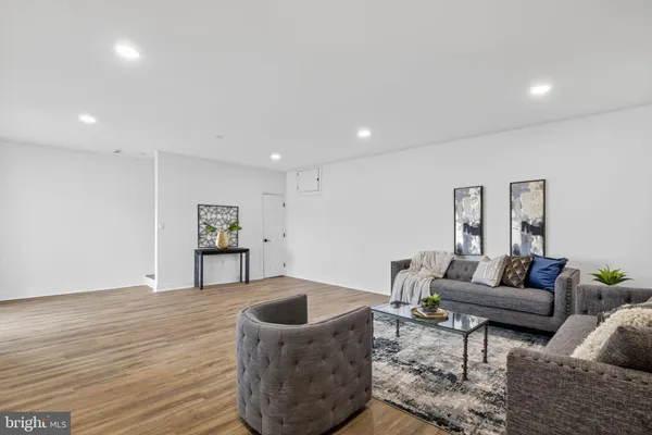 a living room with furniture and a couch
