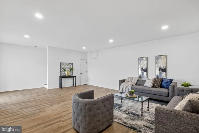 a living room with furniture and a couch