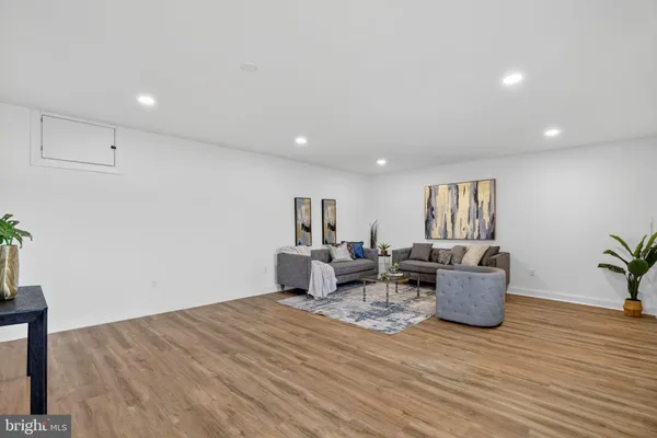 a bathroom with a toilet sink shower and mirror