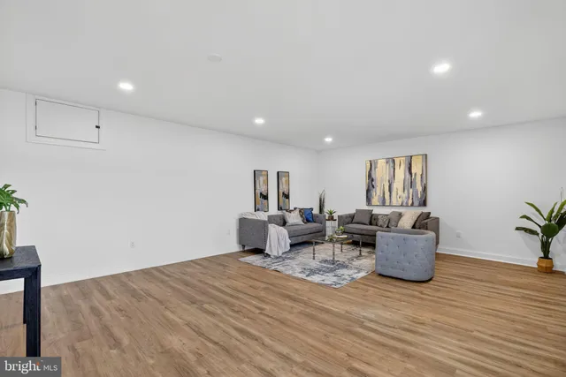 a bathroom with a toilet sink shower and mirror