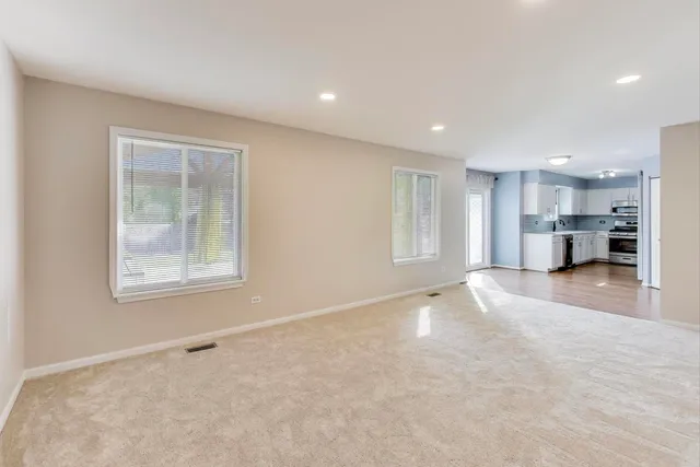 a bathroom with a sink mirror toilet and bathtub
