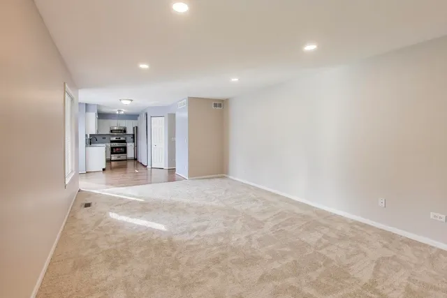 a view of swimming pool with a patio