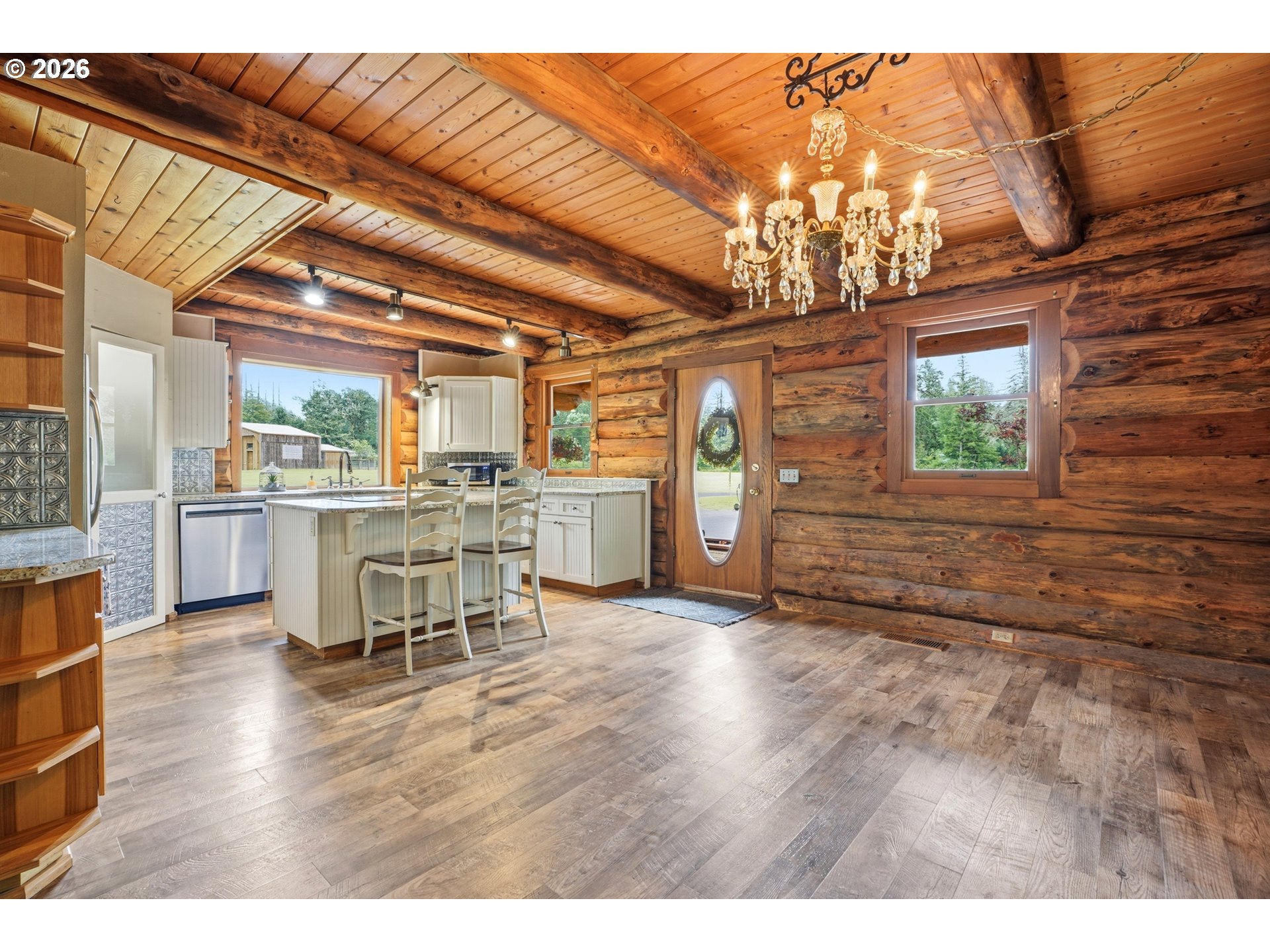 29870 South Dhooghe Road Colton, OR 97017 - Photo 7 of 48 a view of a dining room with furniture and wooden floor