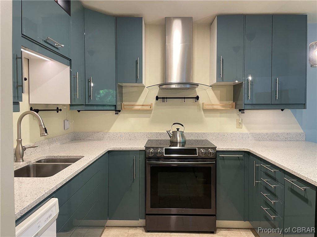 68 Villa Ridge Drive, Unit 4F Hartfield, VA 23071 - Photo 15 of 23 Kitchen featuring stainless steel range with electric stovetop, wall chimney exhaust hood, dishwasher, and light stone countertops