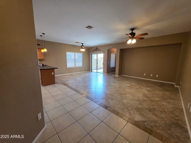 a view of a livingroom with a staircase