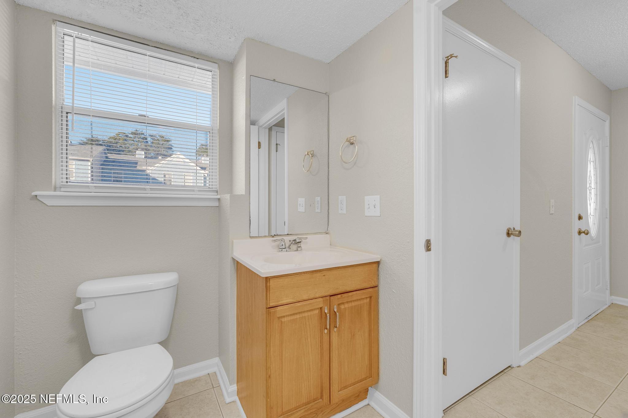 791 Assisi Lane, Unit 1104 Jacksonville, FL 32233 - Photo 7 of 37 Downstairs Half Bath