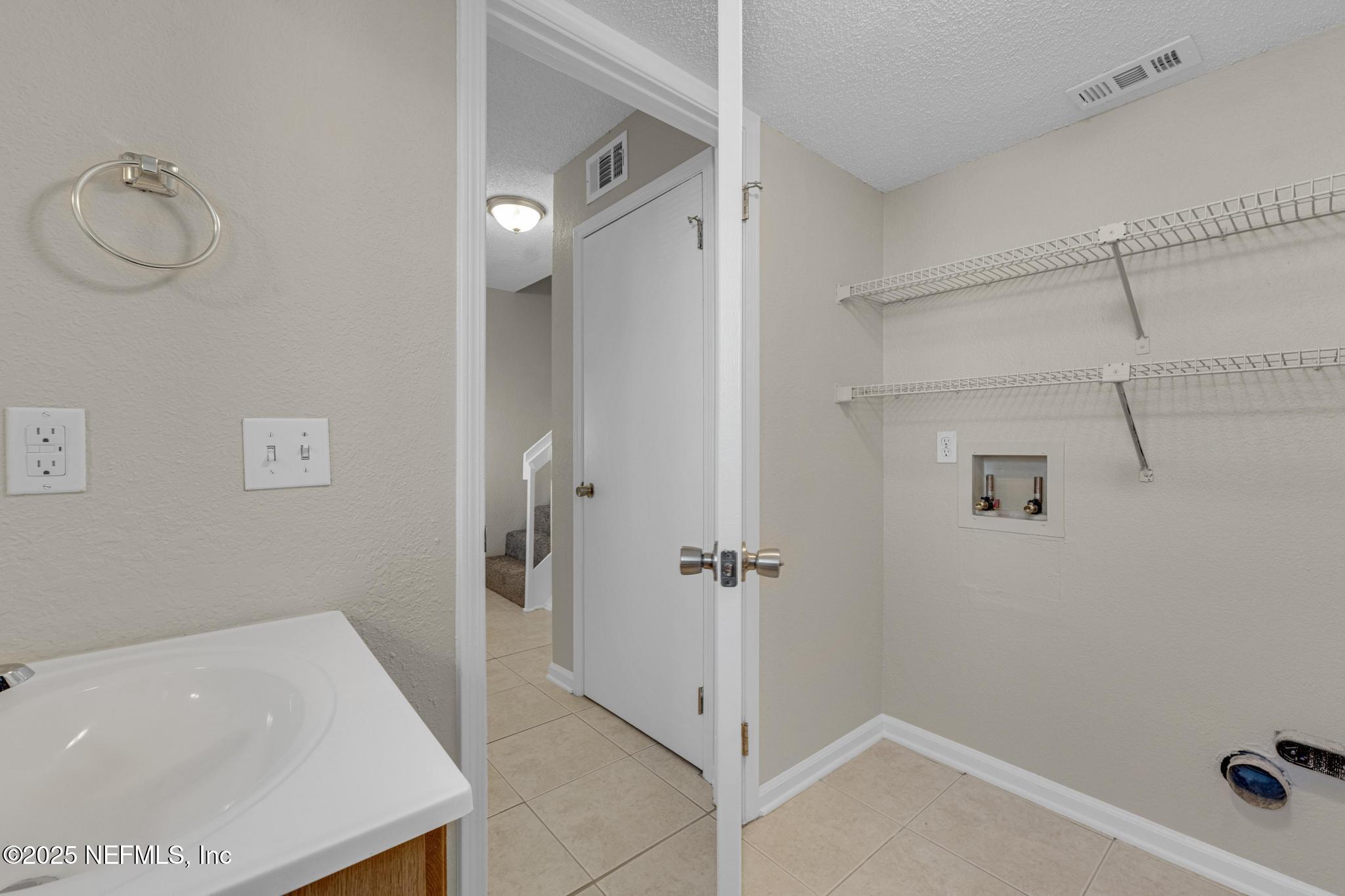 791 Assisi Lane, Unit 1104 Jacksonville, FL 32233 - Photo 8 of 37 Downstairs Laundry