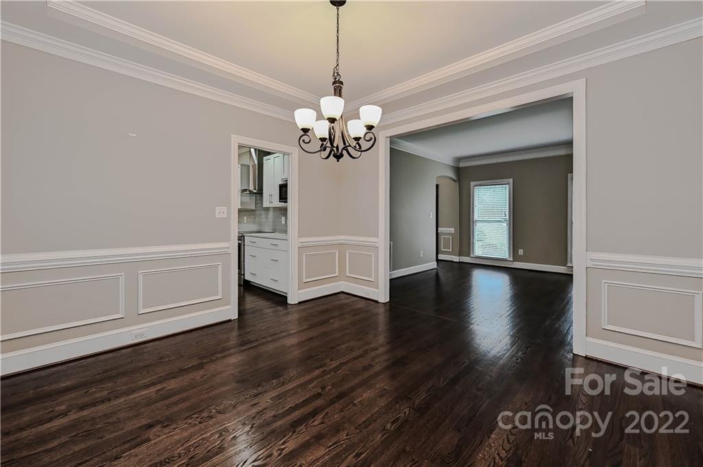 9528 Millen Drive Harrisburg, NC 28075 - Photo 13 of 48 a view of a livingroom with wooden floor