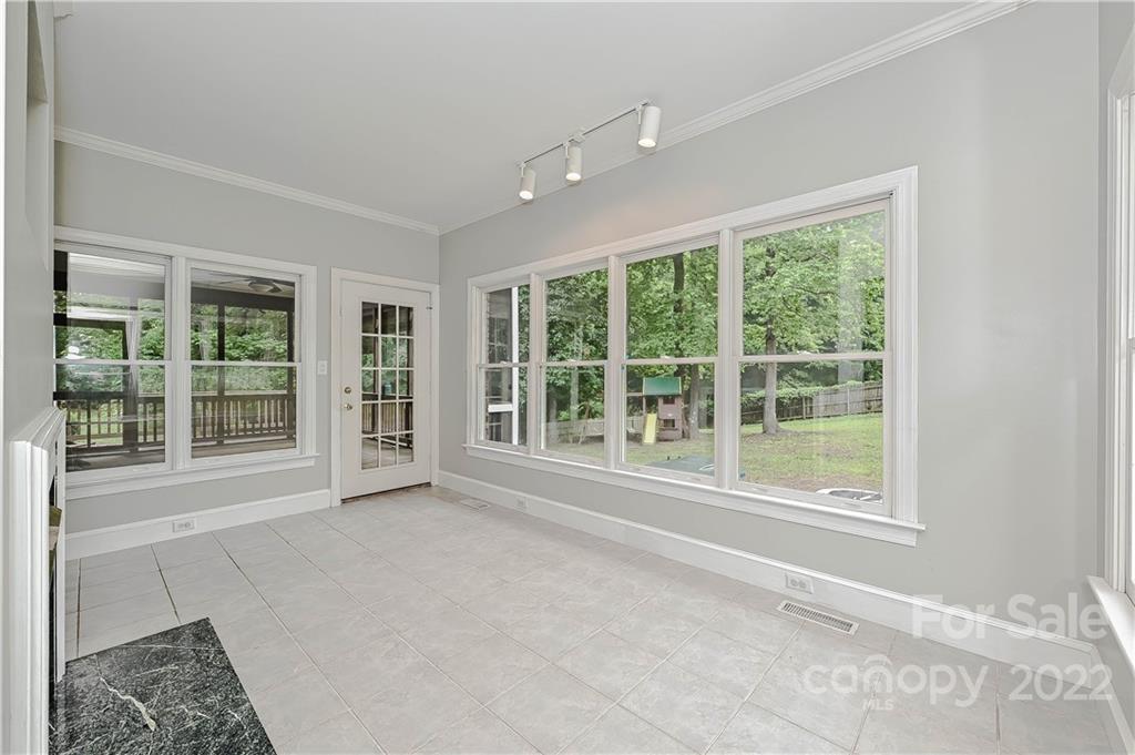9528 Millen Drive Harrisburg, NC 28075 - Photo 21 of 48 a view of an empty room with a window