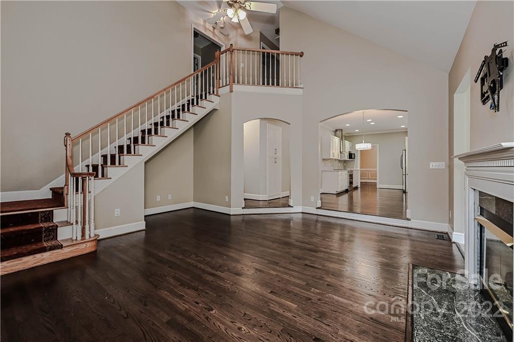 9528 Millen Drive Harrisburg, NC 28075 - Photo 25 of 48 a view of an entryway with wooden floor