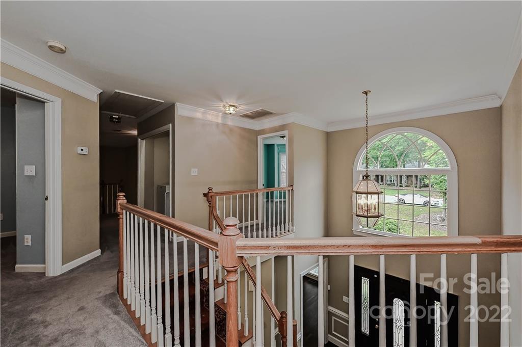 9528 Millen Drive Harrisburg, NC 28075 - Photo 30 of 48 a view of entryway with wooden floor