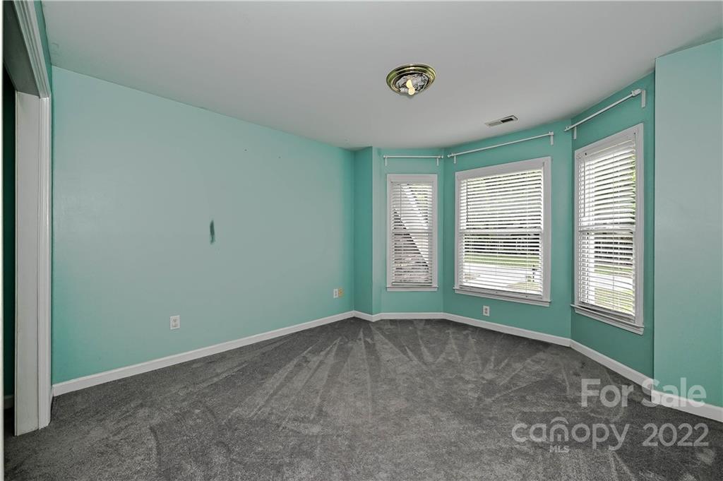 9528 Millen Drive Harrisburg, NC 28075 - Photo 36 of 48 a view of an empty room with a window