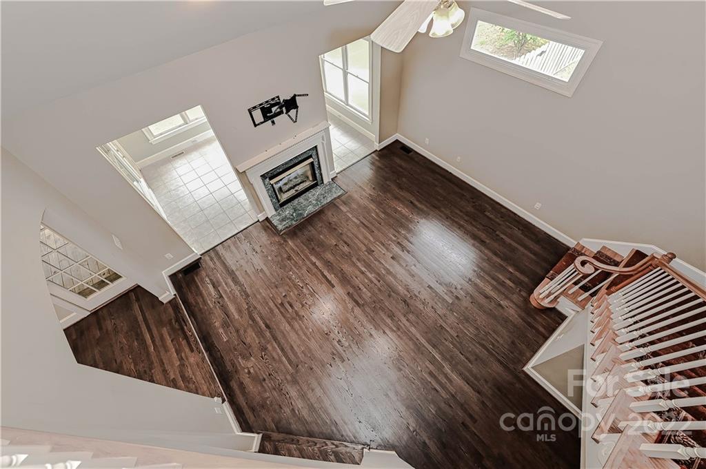 9528 Millen Drive Harrisburg, NC 28075 - Photo 38 of 48 a view of an entryway with wooden floor