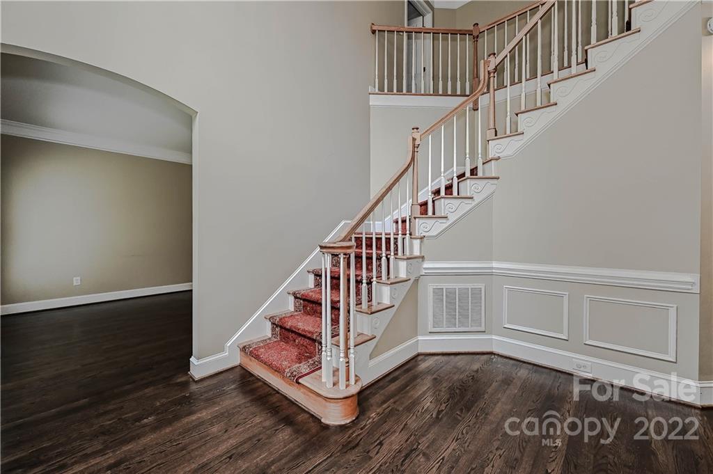 9528 Millen Drive Harrisburg, NC 28075 - Photo 4 of 48 a view of entryway with wooden floor
