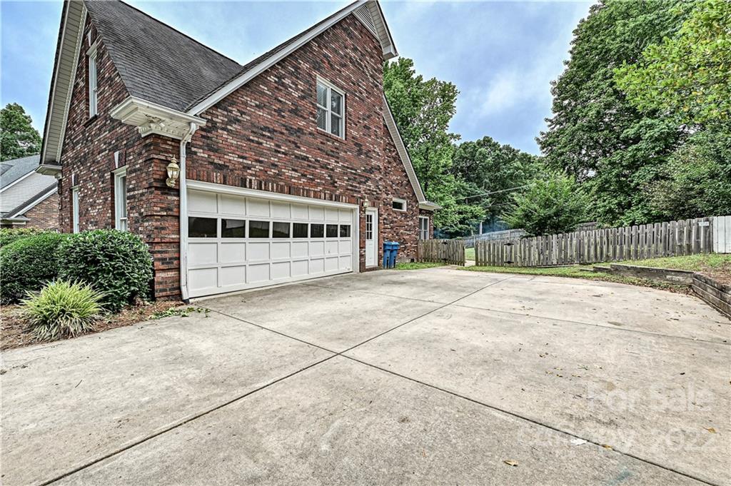 9528 Millen Drive Harrisburg, NC 28075 - Photo 48 of 48 a view of a entrance gate of the house