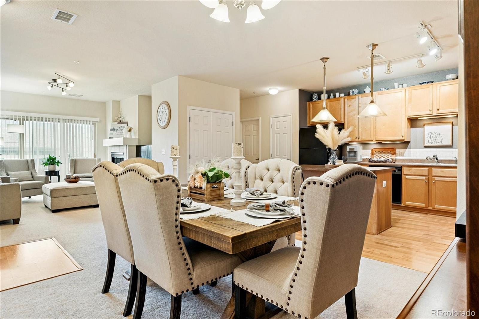 9370 Las Ramblas Court, Unit R Parker, CO 80134 - Photo 13 of 39 a view of a dining room with furniture