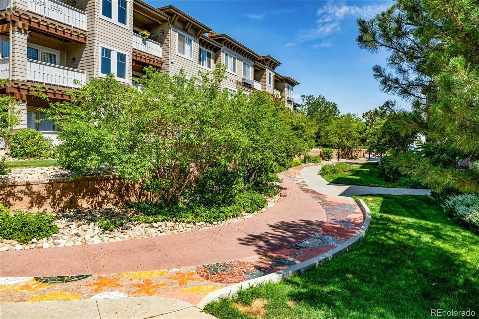 9370 Las Ramblas Court, Unit R Parker, CO 80134 - Photo 30 of 39 a view of a back yard of the house
