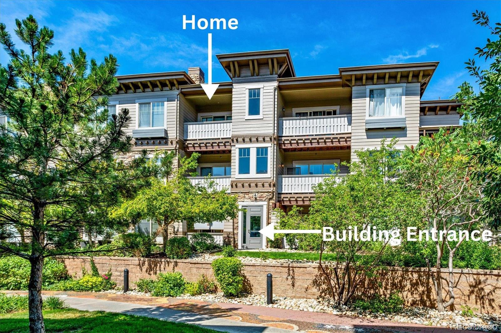9370 Las Ramblas Court, Unit R Parker, CO 80134 - Photo 32 of 39 a front view of a building with garden