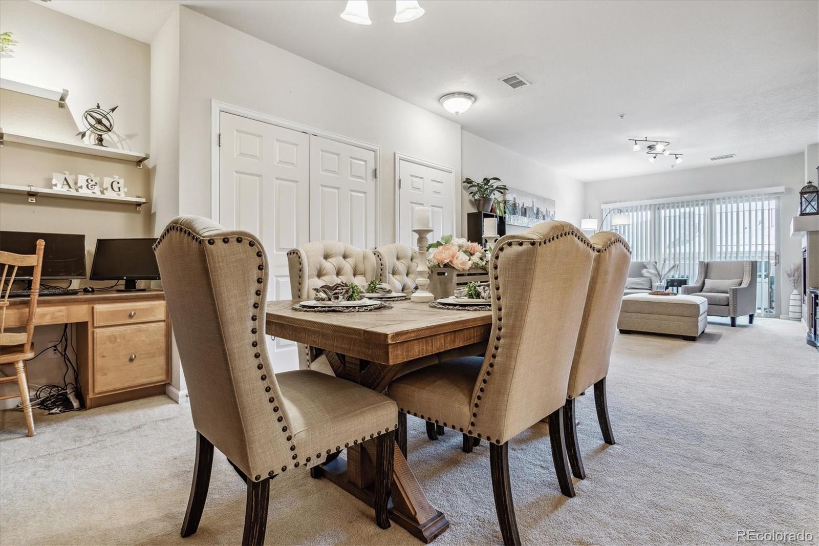 9370 Las Ramblas Court, Unit R Parker, CO 80134 - Photo 39 of 39 a view of a dining room with furniture
