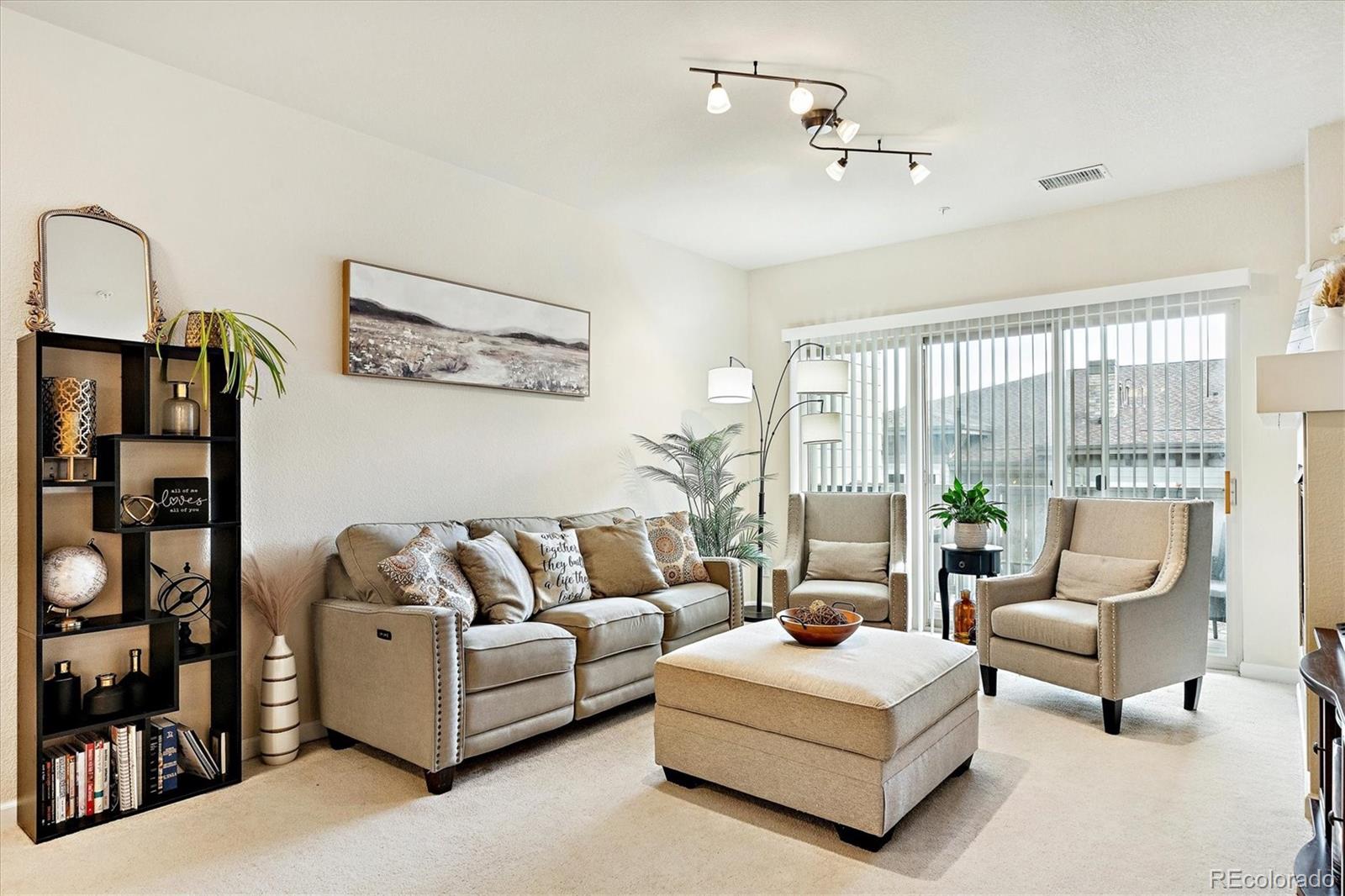 9370 Las Ramblas Court, Unit R Parker, CO 80134 - Photo 6 of 39 a living room with furniture