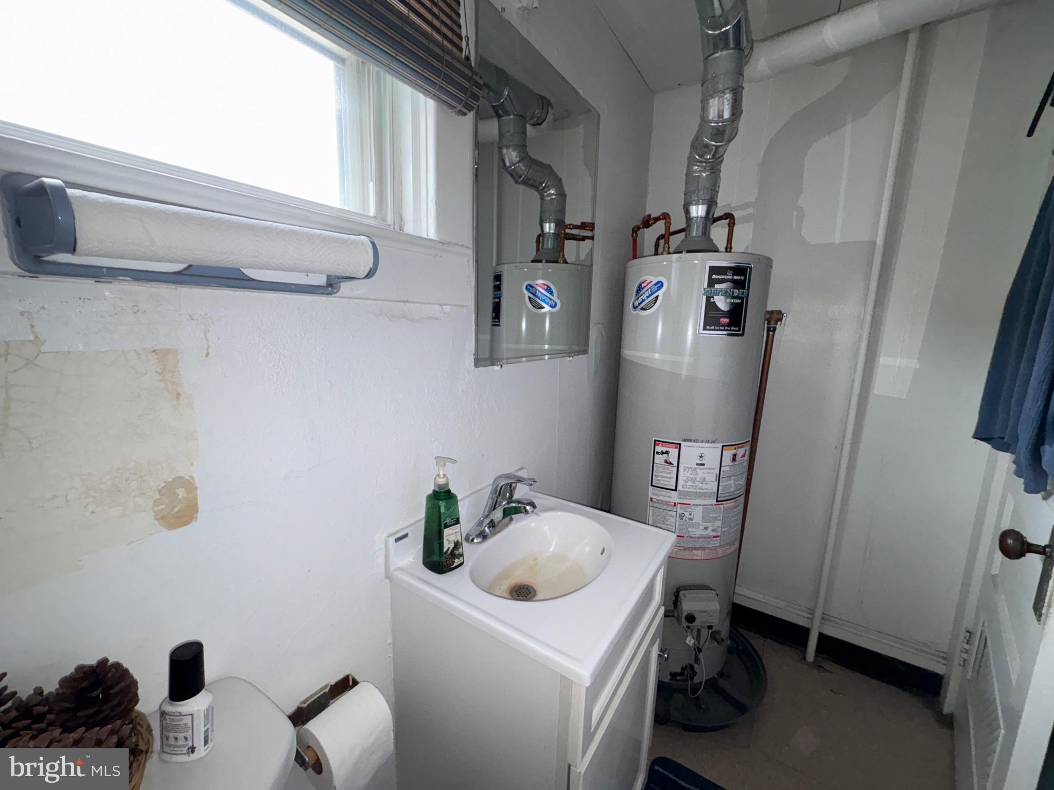 15 South Forklanding Road Maple Shade, NJ 08052 - Photo 13 of 30 a bathroom with a sink toilet and shower