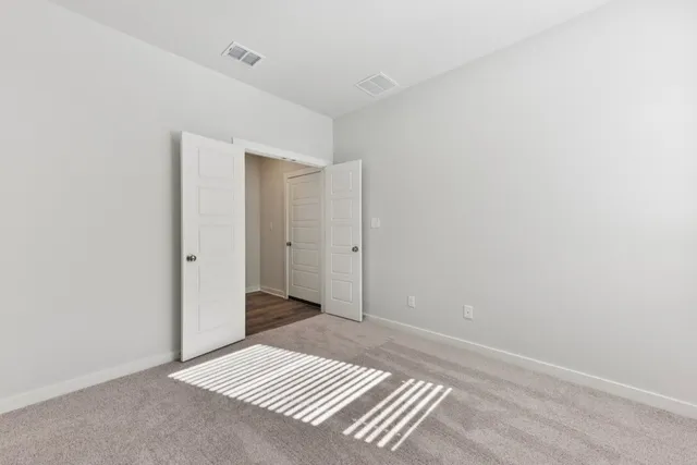 wooden floor with white walls
