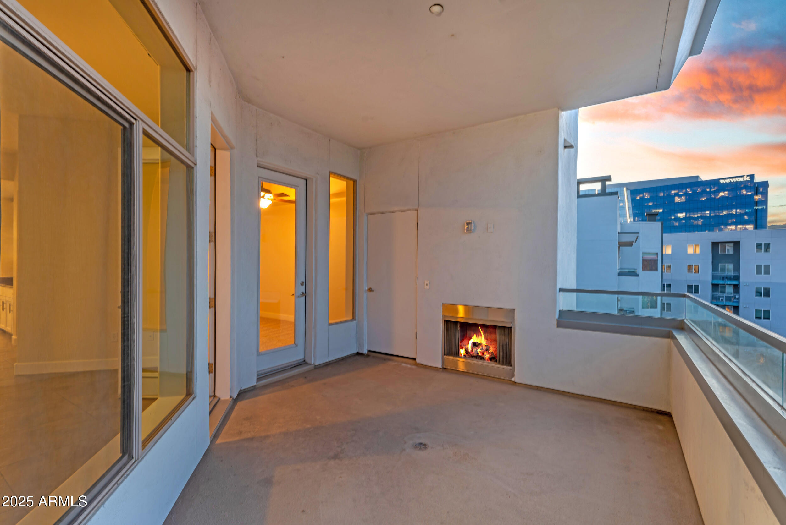 945 East Playa Del Norte Drive, Unit 5005 Tempe, AZ 85288 - Photo 25 of 69 a view of an empty room with a fireplace and a window