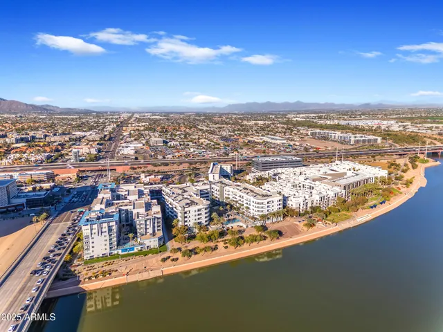 a group of cars parked on the side of street