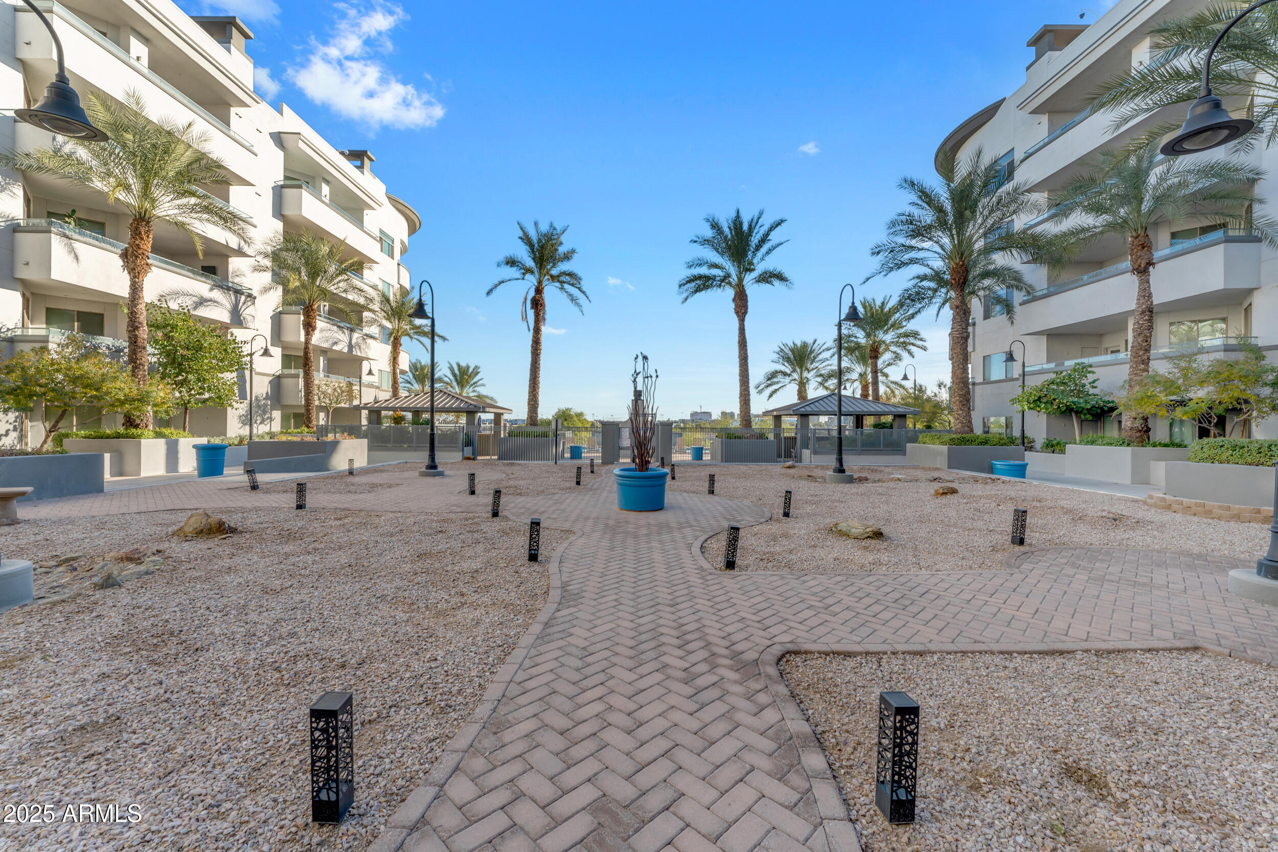 945 East Playa Del Norte Drive, Unit 5005 Tempe, AZ 85288 - Photo 61 of 69 a group of cars parked on the side of street