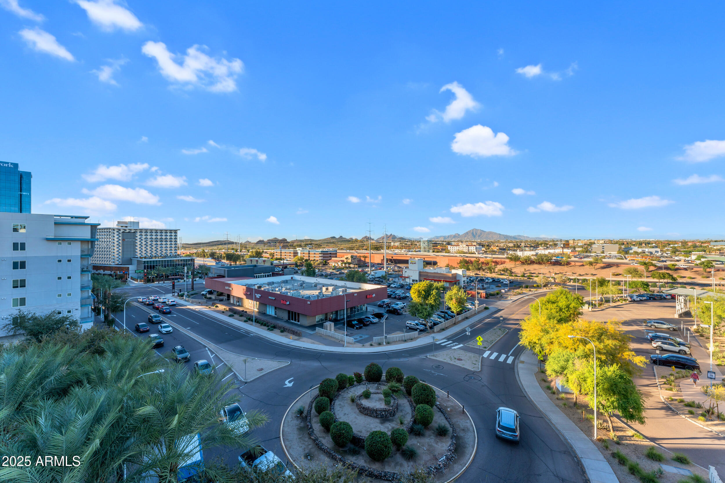 945 East Playa Del Norte Drive, Unit 5005 Tempe, AZ 85288 - Photo 66 of 69 a view of a swimming pool with outdoor seating