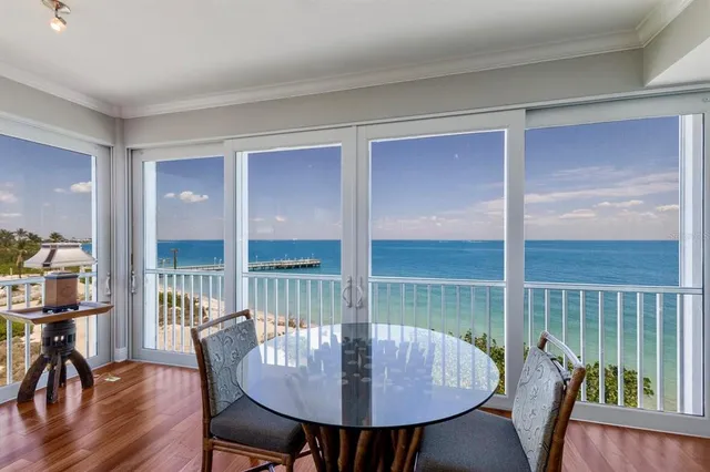 a spacious bathroom with a double vanity sink and a mirror