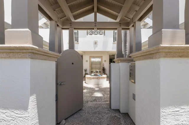 a view of a livingroom with wooden floor and furniture