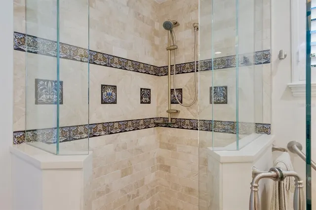 a view of a swimming pool with an ocean view