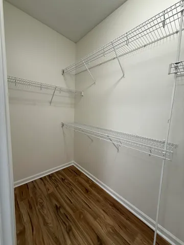 a view of a room with racks on the wall
