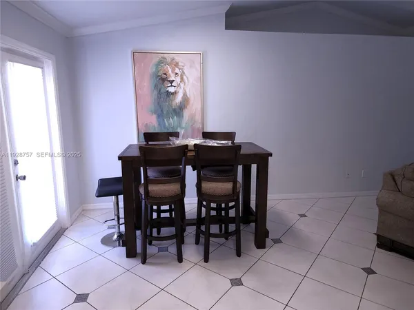 a view of a dining room with furniture