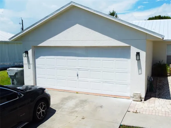 a car parked in front of a house