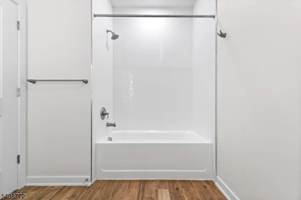 a kitchen with stainless steel appliances a stove a sink and a refrigerator
