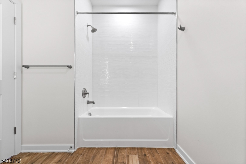 321 East 3rd Street, Unit 525 Plainfield, NJ 07060 - Photo 23 of 43 a bathroom with a shower