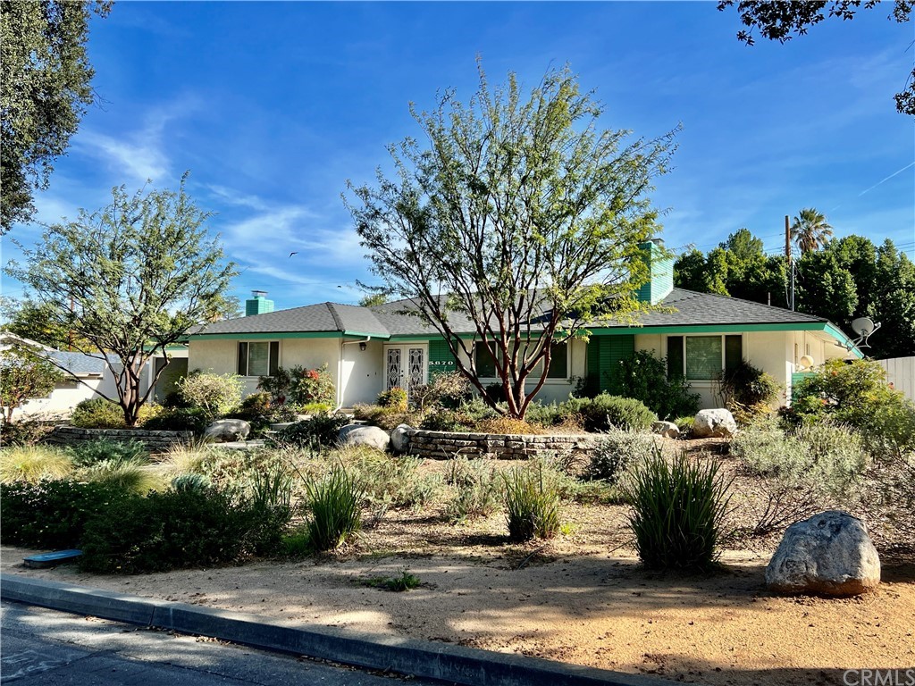 5670 Argyle Way Riverside, CA 92506 - Photo 1 of 1 a view of a house with backyard patio and sitting area