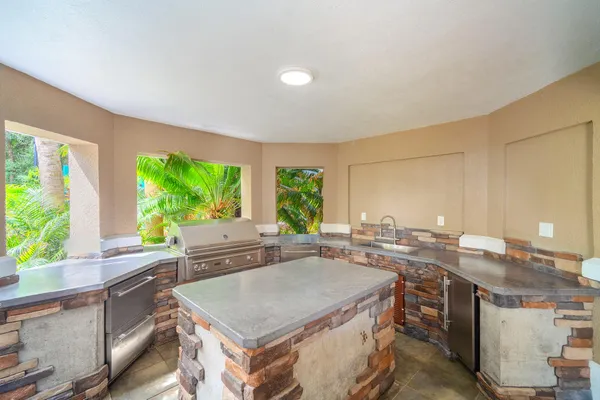 a view of a swimming pool with a patio